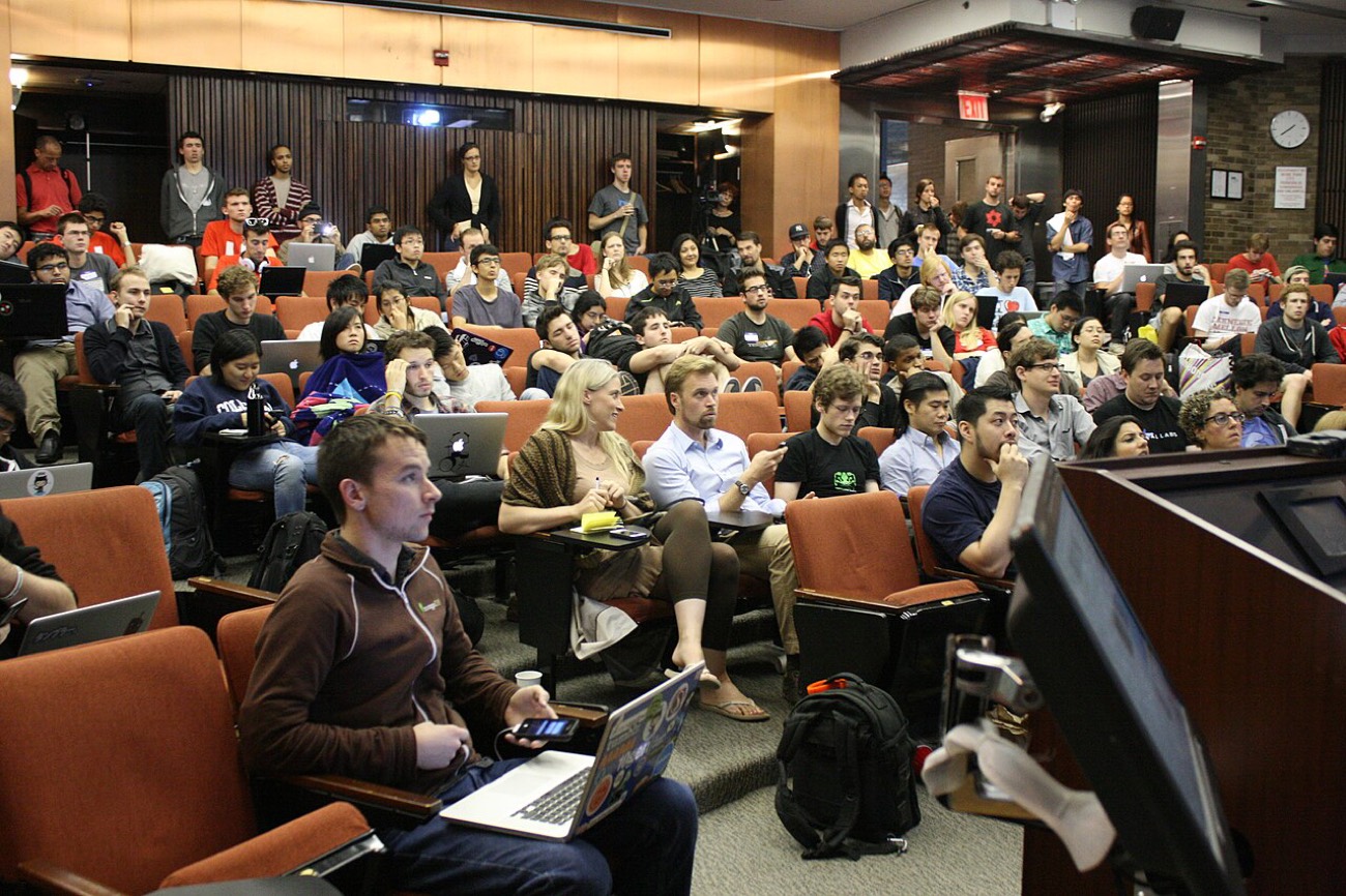 A full auditorium at a research conference